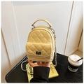 Creamy yellow quilted mini backpack with silver metal twist-lock and chain strap - Yellow