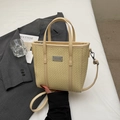Elegante borsa a secchiello beige in pelle intrecciata con doppi manici e tracolla - Giallo senza pendente