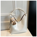 White minimalist PU leather tote bag featuring a cute brown bear charm with fashion detail - Rice White (With Charm)