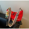 Detail of red canvas crescent bag with wide striped strap and cute doll pendant on side - Wine Red With Pendant