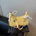 Pale yellow patent leather crescent underarm bag with pearl bow and heart charm - Yellow (With Pendant)