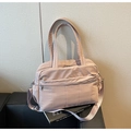 Dusty pink nylon travel bag with multiple compartments and adjustable shoulder strap - Flesh Pink