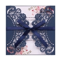 Elegant laser-cut navy blue wedding invitation with satin bow and floral insert card - Magic Blue