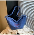 Blue canvas crescent shoulder bag with pleated strap and letter print detail - Blue