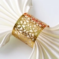 Sparkling gold hollow pattern napkin ring on white silk cloth for elegant table decor - 16cm / Sparkling Gold