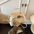 Chic beige textured leather Kelly style handbag with a silver grape bag charm - Off-White (With Pendant)