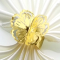 Detail of a hollow flower napkin ring in gold metal finish on a white silk cloth - 20cm / Mirror Gold