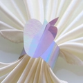 Macro detail of iridescent laser apple napkin ring on elegant white satin fabric - 17.5cm / Mirror Iridescent