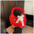 Vibrant red leather handbag with ruffled handle, lace bow, and pearl charm - Red with Pendant