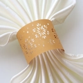 Detalle de servilletero de papel con copo de nieve dorado cortado con láser - Dorado
