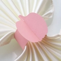 Close-up of pink paper pumpkin leaf napkin ring on beige satin fabric for table decor - 17.8CM / Pink