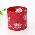 Detail of red laser-cut snowflake paper napkin ring for Christmas table decor - Pearlescent Red