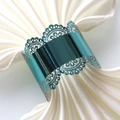 Teal lace cutout napkin ring with metallic finish on white satin fabric for weddings - Mirror Indigo