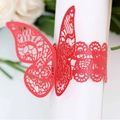 Red laser-cut butterfly napkin ring with hollow lace pattern for festive table decor - Pearlescent Red