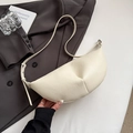 Chic beige dumpling crossbody bag with lychee texture on a dark blazer background - Rice White (No Pendant)