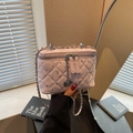 Pink quilted crossbody bag with rhinestone accents and silver chain strap - Pink