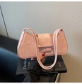 Detail of pink cracked leather shoulder bag with a stylish bow knot accent - Pink