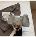 Detail of silver metallic wrinkled texture bag featuring a bow and dual shoulder straps - Silver