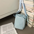 Hellblaue Nylon-Umhängetasche mit Kordelzug und weißem Reißverschluss für Schüler - Blau