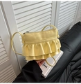 Light yellow shoulder bag with layered ruffle design and glossy leather finish - Yellow
