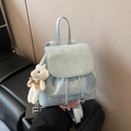 Mini light blue bucket backpack in glossy PU leather with a cute plush bear charm - Blue