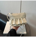 Chic pleated crossbody bag in creamy white finish with layered ruffle detail - White