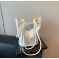 Detail of white crocodile embossed leather tote bag with MER'PAI branding and bucket shape - Off White