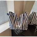 Blue and white striped canvas tote bag with shoulder straps and logo patch - Blue