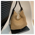 Beige handwoven crochet hobo bag with dark brown leather strap and honeycomb texture - Brown