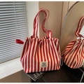 Minimalist red and white striped canvas bucket bag with drawstring and brand label - Burgundy