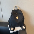 Lightweight black nylon backpack for women with beige leather handle and logo detail - Black