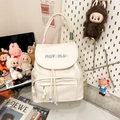 Chic beige faux leather drawstring backpack with colorful embroidery and woven handle - White