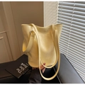 Yellow faux leather bucket bag with crocodile texture and dual shoulder straps - Yellow