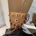 Woven bucket bag with floral accents and colorful tassels for beach vacations - Khaki