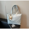 Minimalist light blue tote bag with embossed texture and a cute white teddy bear charm - Blue (With Charm)