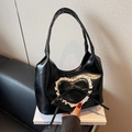 Black glossy leather tote bag with white lace heart patch and delicate bow detail - Black