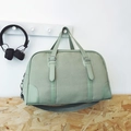 Bean green travel handbag with texture fabric and wide adjustable shoulder strap - Green