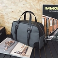 Large black and gray travel bag with dual handles and adjustable shoulder strap - Black