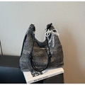 Dark grey hobo bag with rope handle and lace pearl bow charm on white books - With Pendant Style / Black (With Pendant)