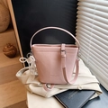 Pink bucket bag with lychee grain leather, pearl bow charm and adjustable strap - Pink with Pendant