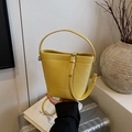 Chic yellow lychee leather bucket bag with silver hardware and adjustable strap - Yellow Without Pendant