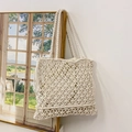 Handmade cream white woven straw tote bag with tassel detail for summer vacation - White