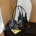 Black pleated underarm baguette bag with MKMX metal plate and side pocket - Black