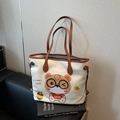 Large beige commuter tote bag with brown straps and cute cartoon bear graphic - Off-white and Coffee