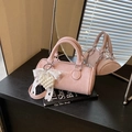 Pink cylinder pillow bag with pearl lace bow charm and adjustable shoulder strap - Pink