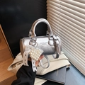 Metallic silver cylinder handbag with pleated texture and pearl heart charm detail - Silver