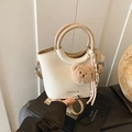 Cream bucket bag with khaki handle, fashion lettering and cute brown plush bear charm - Off White