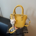 Yellow litchi pattern leather mini tote bag with white plush bear charm and strap - Yellow with Pendant
