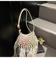 White woven crochet shoulder bag with bohemian tassels and decorative wooden beads - Off White