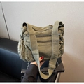 Detail of army green canvas crossbody bag with multiple zipper pockets and adjustable strap - Green